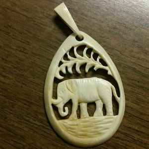 Vintage carved elephant pendant